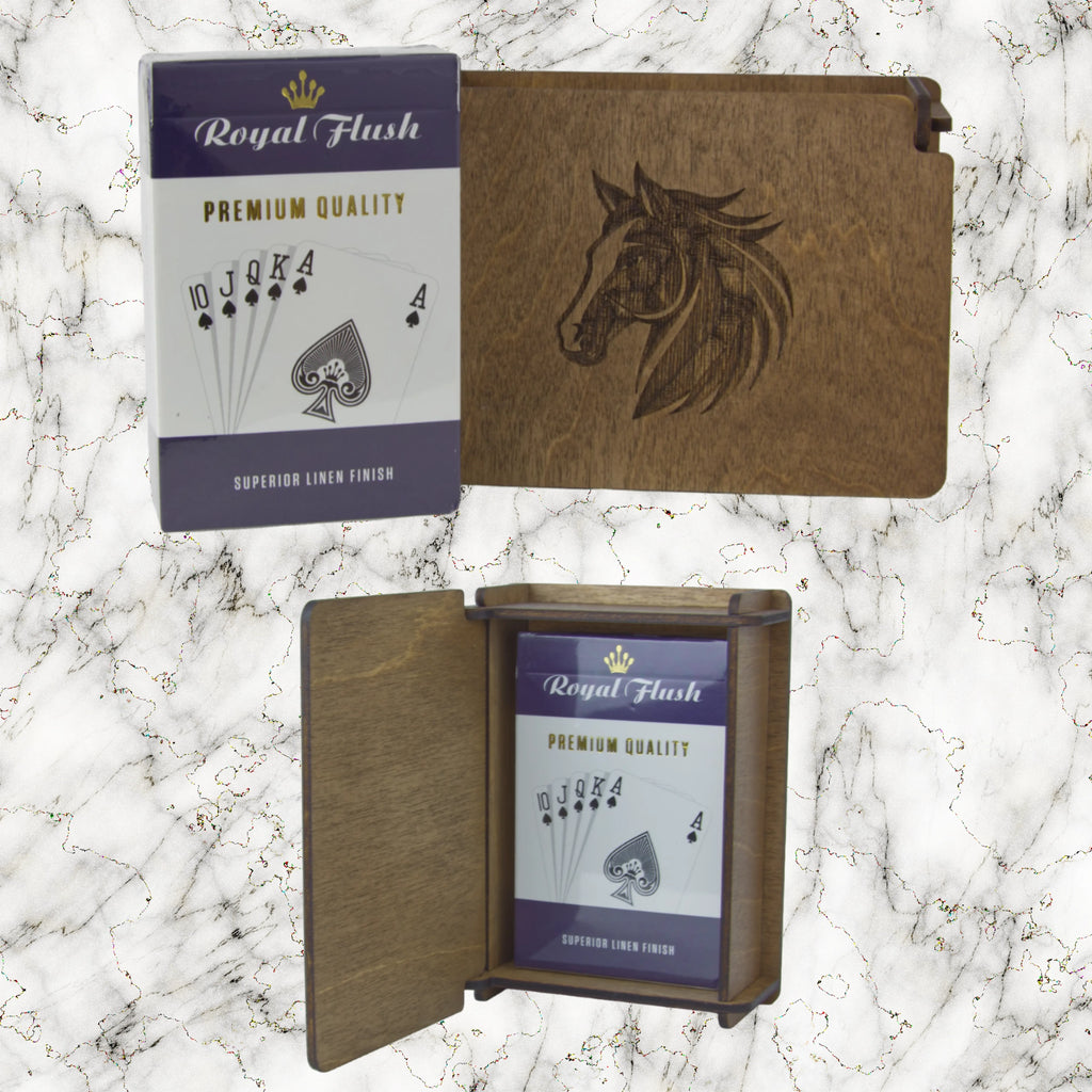 Wooden card holder with engraved horse design and Royal Flush brand packaging on a marble background