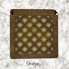 Decorative trinket box with pattered lid on a marble background