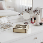 Decorative trinket box with patterned lid on a dressing table