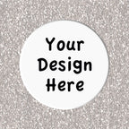 Circular white coaster with 'Your Design Here' text on a silver glittery background